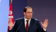 Tunisia's Prime Minister Youssef Chahed gestures as he speaks during a national conference over 2019 budget in Tunis, Tunisia, September 14, 2018. REUTERS/Zoubeir Souissi/File Photo