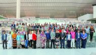 The participants of international meeting on access to information pose for a group photo at QNL. 
