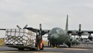 Boxes of tangerines are loaded into South Korean Air Force's cargo plane at the Jeju International Airport in Jeju Island, South Korea November 11, 2018. Yonhap via REUTERS 