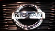 The logo of Nissan is seen at the headquarters of Nissan Motor Corporation in Yokohama on November 20, 2018. / AFP / Martin BUREAU 