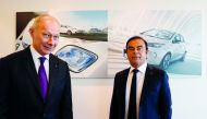 Carlos Ghosn (L), Chairman and Chief Executive Officer of Renault, and Thierry Bollore, Renault Chief Operating Officer, attend the French carmaker Renault's 2017 annual results presentation at their headquarters in Boulogne-Billancourt, near Paris, Franc