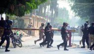Pakistani security forces take measures outside the Chinese consulate after an armed attack in Pakistan’s southern port city of Karachi on November 23, 2018. At least seven people were killed. Sabir Mazhar/Anadolu Agency
