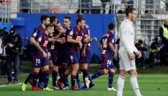 Eibar's Gonzalo Escalante celebrates scoring their first goal with teammates REUTERS/Vincent West