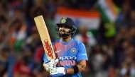 India's batsman Virat Kohli celebrates as he completes his 50-runs during a T20 international cricket match against Australia at the SCG in Sydney on November 25, 2018. (AFP / Saeed KHAN)
