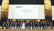 The participants, including top officials of Nakilat, the official host of the 2018 Autumn SIGTTO Board & AGM, posing for a group picture on the sidelines of the AGM in Doha, yesterday.  