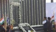 Maharashtra Chief minister Devendra Fadnavis pays respect at the Police Memorial, during an event to commemorate the 10th anniversary of the 2008 Mumbai militant attacks in Mumbai on November 26, 2018. AFP/Indranil Mukherjee 