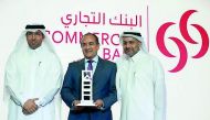 Joseph Abraham (centre), Group Chief Executive Officer, Commercial Bank; with Yousuf Mohamed Al Jaida (right), Chief Executive Officer, QFC Authority; and Hamed Al Saadi, Chief Financial and Tax Officer, QFC Authority, during the award ceremony at Four Se