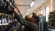 A miner puts away his equipment after a night shift at the shaft at the Knurow mine on November 23, 2018 in Knurow, in Poland's southern mining region of Silesia. AFP / Janek SKARZYNSKI 