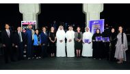 H E Dr Mohammed bin Saleh Al Sada (centre), British Ambassador Ajay Sharma (fifth left), HSBC Qatar CEO Abdul Hakeem Mostafawi (seventh right), and other dignitaries with Qatar’s first Study UK Alumni Awards winners at MIA on Saturday. Pic: Abdul Basit / 