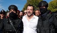 FILE PHOTO: Italian Interior Minister Matteo Salvini poses with two members of the Central Security Operations Service (NOCS), a SWAT team of the Polizia di Stato, during a visit to celebrate their anniversary in Rome, Italy October 10, 2018. REUTERS/Remo