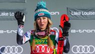 Mikaela Shiffrin of the United States celebrates as she takes the podium in the ladies Super G race in the 2018 FIS alpine skiing world cup at Lake Louise Ski Resort. Sergei Belski