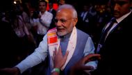 FILE PHOTO: Indian Prime Minister Narendra Modi greets attendees at the end of a sideline event ahead of the Group 20 summit called 