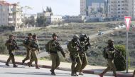 Israeli forces intervene in Palestinians during an Israeli raid in Ramallah, West Bank on December 10, 2018. (Issam Rimawi /Anadolu Agency)