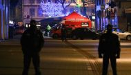 Policemen patrol in the rue des Grandes Arcades in Strasbourg, eastern France, after a shooting breakout, on December 11, 2018. AFP / Sébastien BOZON