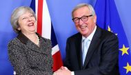 President of the European Commission Jean-Claude Juncker (R) meets British Prime Minister Theresa May (L) in Brussels, Belgium on December 11, 2018. ( Dursun Aydemir - Anadolu Agency )