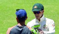 Australia's captain Tim Paine (R) shakes hand with Indian captain Virat Kohli after winning the second Test cricket match between Australia and India in Perth on December 18, 2018.  AFP / William West