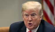 U.S. President Donald Trump leads a roundtable discussion on school safety and the new Federal Commission on School Safety report, with family members of shooting victims, state and local officials, in the Roosevelt Room on December 18, 2018 in Washington