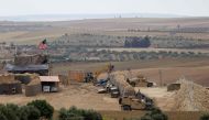 FILE PHOTO: In this file photo taken on May 08, 2018 shows vehicles and structures of the US-backed coalition forces in the northern Syrian town of Manbij. AFP / Delil souleiman