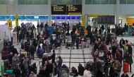 Passengers wait around in the South Terminal building at Gatwick Airport after drones flying illegally over the airfield forced the closure of the airport, in Gatwick, Britain, December 20, 2018. REUTERS/Peter Nicholls