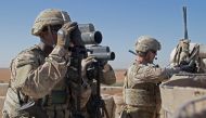 U.S. Soldiers surveil the area during a combined joint patrol in Manbij, Syria, November 1, 2018. Courtesy Zoe Garbarino/U.S. Army