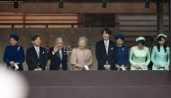 Japan's Emperor Akihito (3rd L) waves during his birthday public appearance with other members of the Imperial family including Crown Princess Masako (L), Crown Prince Naruhito (2nd L), (4th L to R) Empress Michiko, Prince Akishino, Princess Kiko, Princes