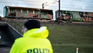 Police keep guard after a train accident on the Great Belt Bridge in Denmark, January 2, 2019. Michael Bager/Ritzau Scanpix 
