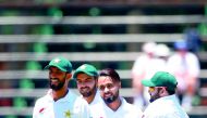 Pakistan bowler Faheem Ashraf (CR) celebrates the dismissal of South African batsman Aiden Markram (not in picture) during the first day of the third Cricket Test match between South Africa and Pakistan at Wanderers cricket stadium on January 11, 2019 in 