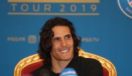 Paris Saint-Germain's Uruguayan forward Edinson Cavani smiles during a press conference on January 14, 2019 in Doha as the team (PSG) start their winter training camp in the Qatari capital. AFP / Karim Jaafar 