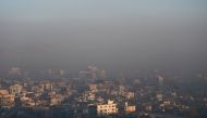 This photograph taken on January 17, 2019, shows a general view of residential areas amid heavy smog conditions in Afghanistan's capital Kabul. AFP / WAKIL KOHSAR