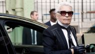 German fashion designer for Chanel, Karl Lagerfeld, arrives to the Chanel women's 2018 Spring/Summer ready-to-wear collection fashion show in Paris on October 03, 2017 . AFP / Francois Guillot 