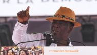 Ivory Coast president Alassane Ouattara delivers a speech at the Felix Houphoet-Boigny stadium in Abidjan during the first Congress of the political alliance 