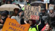 People take part in a march called 