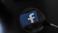 In this file photo taken on January 15, 2019 The logo of social network Facebook is displayed on a smartphone, in Nantes, western France.  / AFP / LOIC VENANCE 