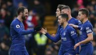 Chelsea's Belgian midfielder Eden Hazard (C) celebrates scoring their second goal from the penalty spot during the English Premier League football match between Chelsea and Huddersfield Town at Stamford Bridge in London on February 2, 2019. AFP / Daniel L