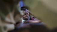 A former ex-Seleka child soldier waits to be released in Bambari, Central African Republic, May 14, 2015. Reuters/Emmanuel Braun/File Photo
 