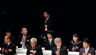 Japanese Prime Minister Shinzo Abe leaves from an annual Northern Territories Day rally that demands the return of a group of disputed islands controlled by Russia in Tokyo, Japan, February 7, 2019. Reuters/Kim Kyung-hoon