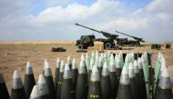 A picture taken on February 9, 2019, near Al-Qaim, a few kilometres away from the last scrap of territory held by IS in eastern Syria, shows wheeled 155 mm gun-howitzer CAESAR system  used by French soldiers engaged in the 