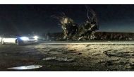 TOPSHOT - A handout picture released by the Iranian news agency Fars News on February 13, 2019, shows a bus that was reportedly blown up by a suicide attack in southeastern Iran on February 13, 2019. / AFP / fars news / Handout 