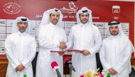 Qatar Equestrian Federation (QEF) President Hamad bin Abdulrahman Al Attiyah shaking hands with Salem Al Nuaimi, Acting General Manager at QNB’s Group Communications, in Doha after signing a sponsorship agreement yesterday. Bader Al Darwish, Secretary Gen