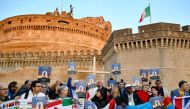 Members of Ending Clergy Abuse (ECA), a global organization of prominent survivors and activists who are in Rome for this week’s papal summit on the sex abuse crisis within the Catholic Church, hold a protest gathering on February 21, 2019 by the Castel S