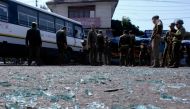 Indian police inspect the site of a grenade blast at a bus station in Jammu on March 7, 2019. Eighteen people were injured on March 7 when a grenade exploded at a bus stop in the Indian city of Jammu, part of the restive state of Jammu and Kashmir, police