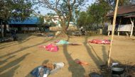 Bodies of policemen, killed in a militant attack, are covered at the Yoetayoke police station, near Sittwe in Rakhine State on March 10, 2019. AFP / STR
