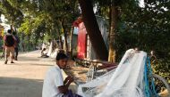 Fishermen on Monpura island, Bangladesh, make fishing nets, October 24, 2018. Thomson Reuters Foundation/Rafiqul Islam