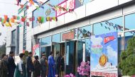 In this picture taken on March 10, 2019 and released from North Korea's official Korean Central News Agency (KCNA) on March 11, North Koreans line up to vote for the Supreme People's Assembly elections at a polling station in an undisclosed location.  