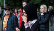 A woman from Afghanistan reacts near Masjid Al Noor mosque in Christchurch, New Zealand, March 17, 2019. REUTERS/Jorge Silva