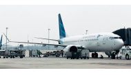 This picture taken on May 15, 2018 shows a Garuda Indonesia Boeing 737 Max 8 at Jakarta International airport in Jakarta.  / AFP / IHWAN IDAMIN HARAHAP