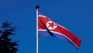 File photo of a North Korean flag flies on a mast at the Permanent Mission of North Korea in Geneva October 2, 2014. REUTERS/Denis Balibouse/File Photo
