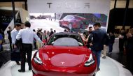 FILE PHOTO: A Tesla Model 3 car is displayed during a media preview at the Auto China 2018 motor show in Beijing, China April 25, 2018. REUTERS/Jason Lee/File Photo