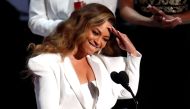 Beyonce reacts after winning the entertainer of the year award. REUTERS/Mario Anzuoni