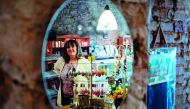The owner, Dale Carr, poses at her shop 